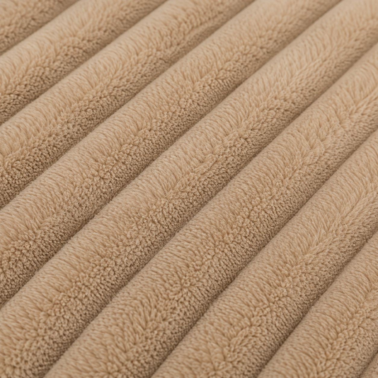 Rectangular dog mattress in beige with a ribbed surface