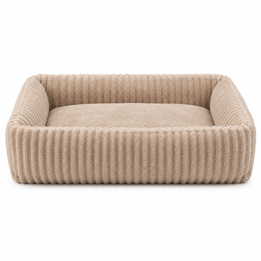 Rectangular dog bed in beige with a ribbed raised rim