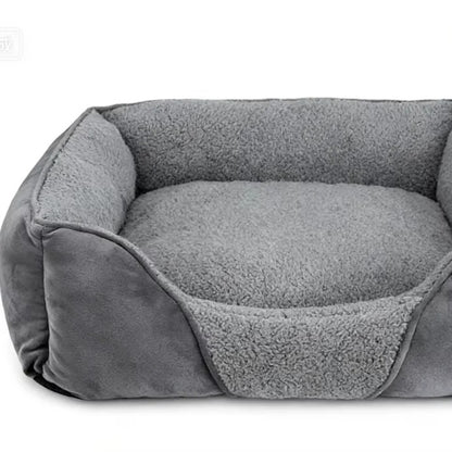 Rectangular dog bed in grey with a raised edge