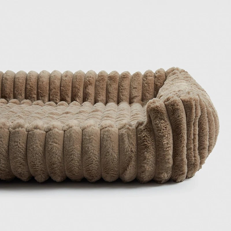 Rectangular dog bed in taupe with a wide ribbed rim