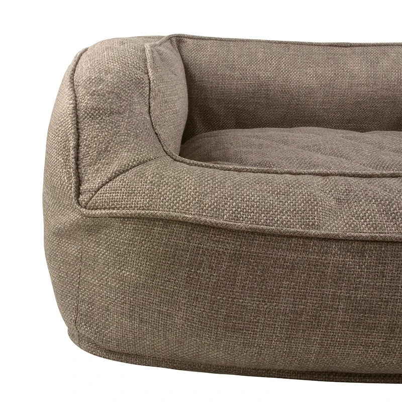 Rectangular dog sofa in beige with upright sides