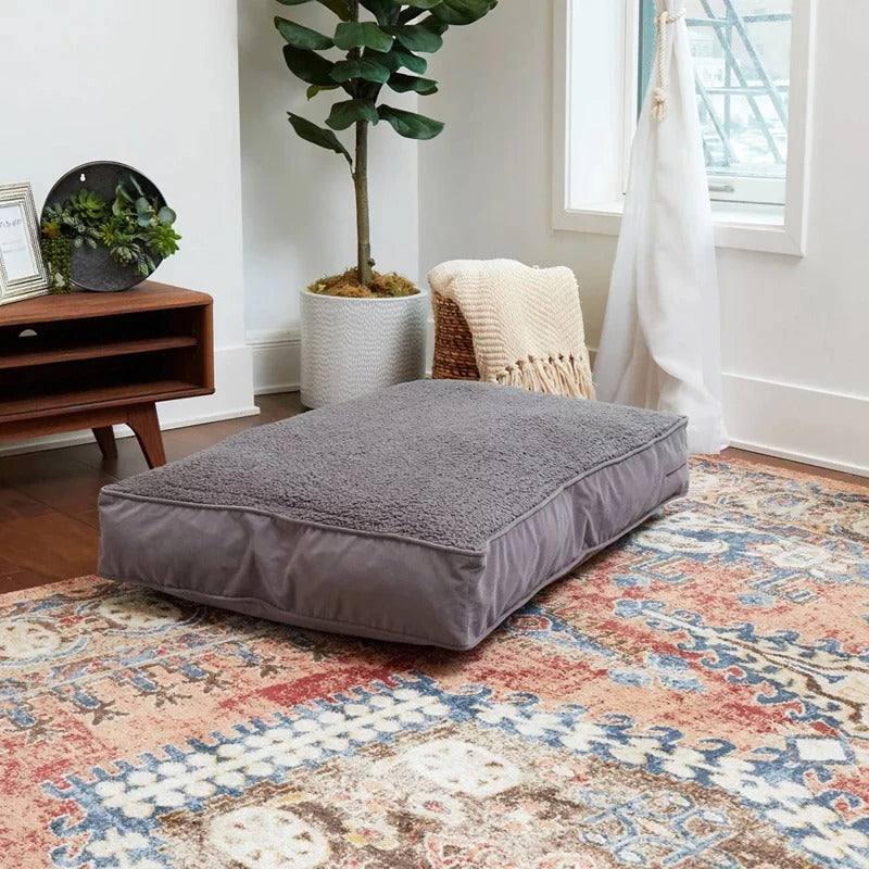 Rectangular dog cushion in grey with a textured top surface